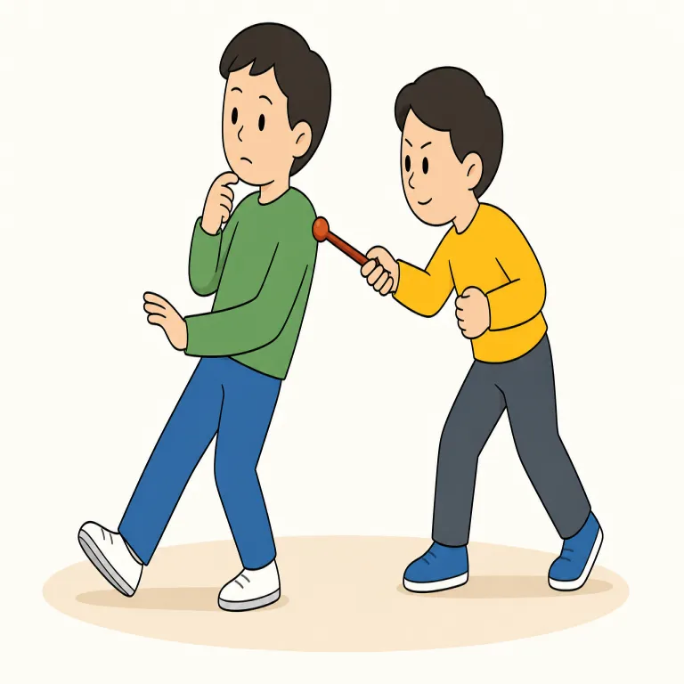 goading（煽る・動詞）の覚え方イラスト — この「煽る」の goading は、相手や集団を言葉・態度で刺激し、怒りや対立へ向かわせる用法として覚えるとよいです